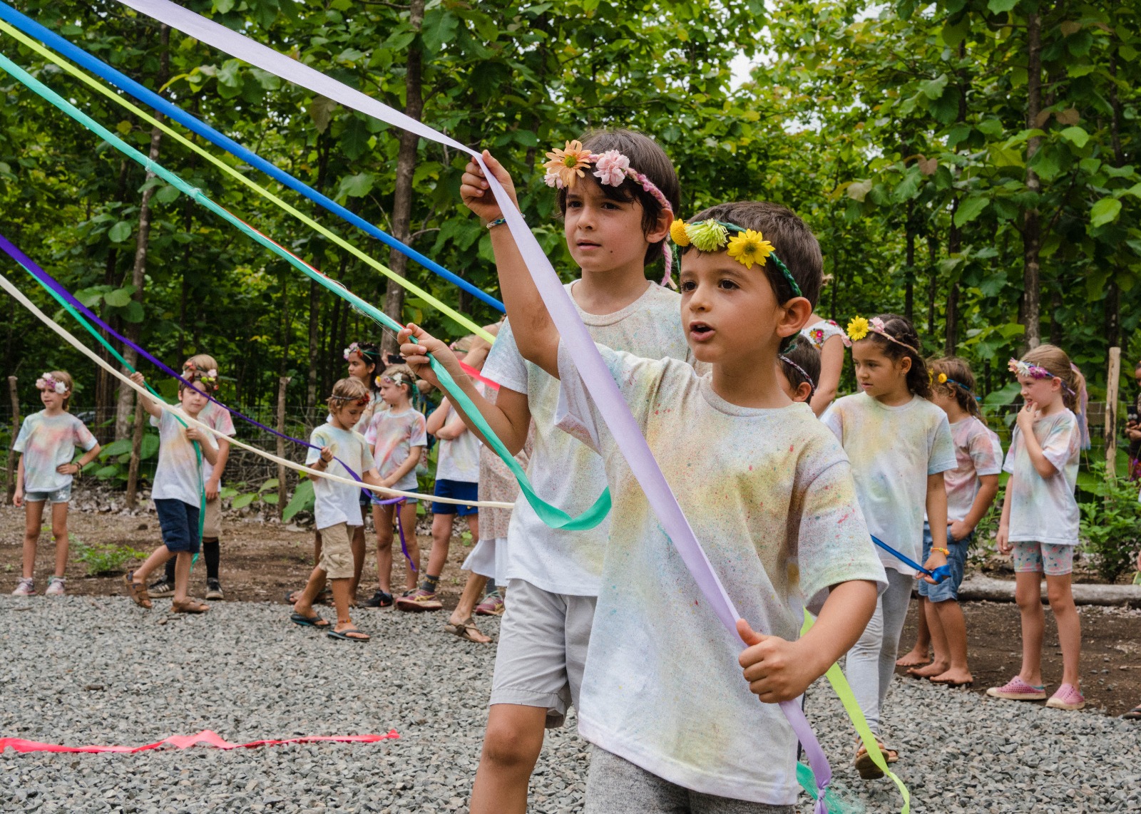 Students celebrating with colorful ribbons during a school event